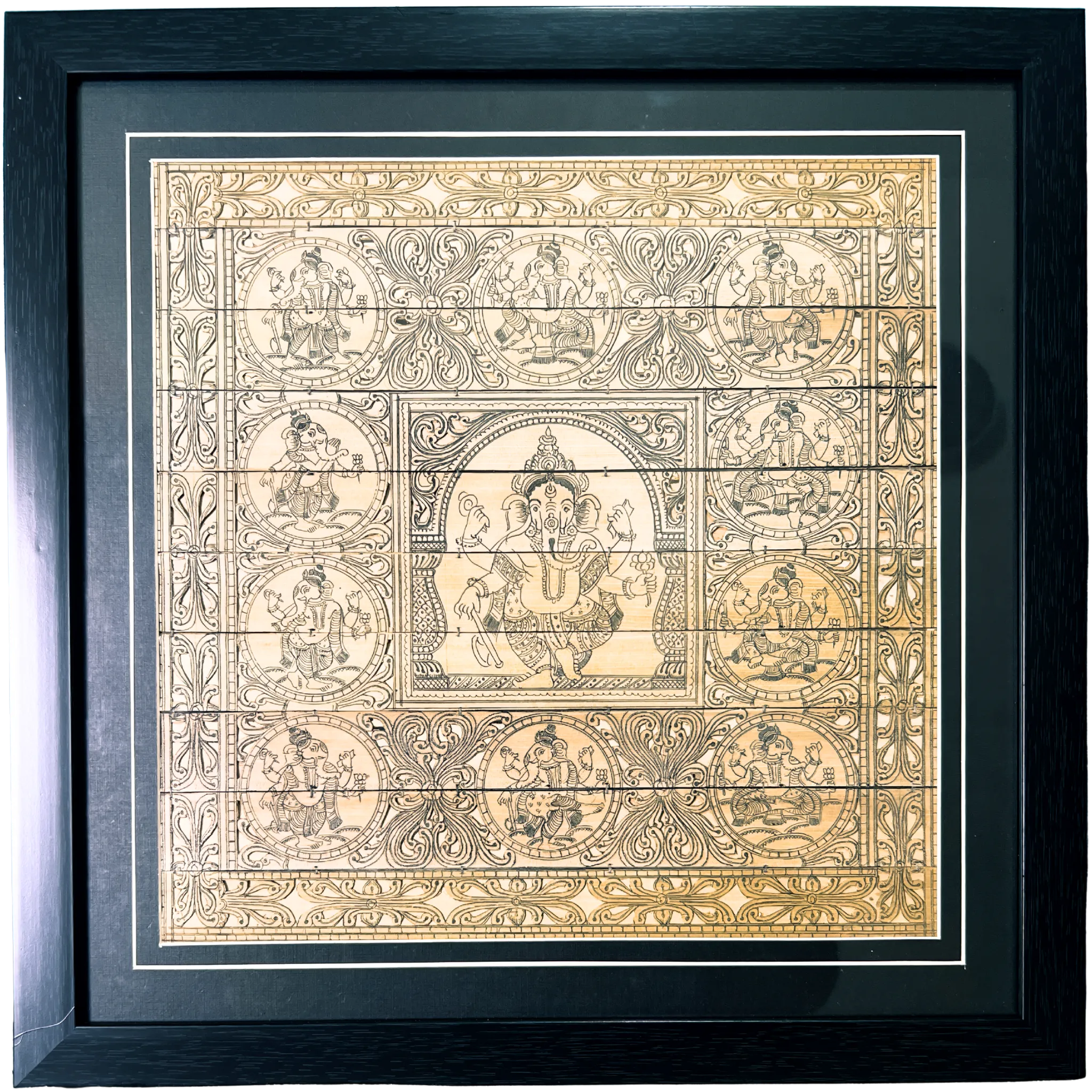 Palm Leaf Engraved Painting | Lord Ganesha Surrounded by His Forms (FRAMED)